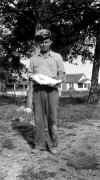 man_with_fish.jpg (81084 bytes)