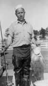 mort_burns_with_fish.jpg (48480 bytes)