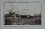 Irving Bowen preparing to move his boat where it had washed up in the yard of the house Hilda was living in at the time of the 1936 Hurricane (Sept.)